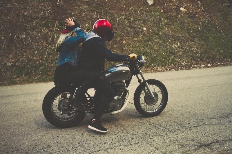 Young riders and motorcycle passenger