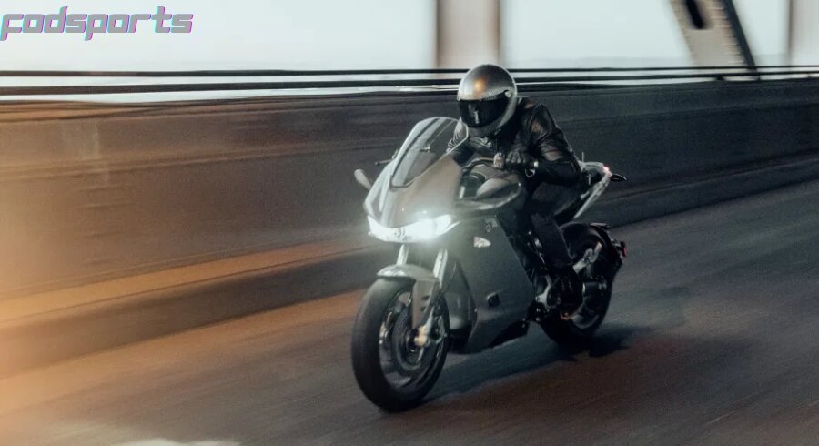 A motorcycle rider is riding fast on the highway