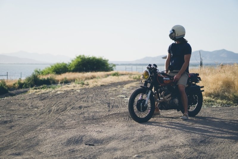 Motorcycle rider with helmet