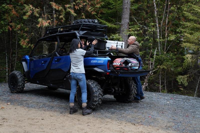 A family riding a recreational sxs for outdoor activity