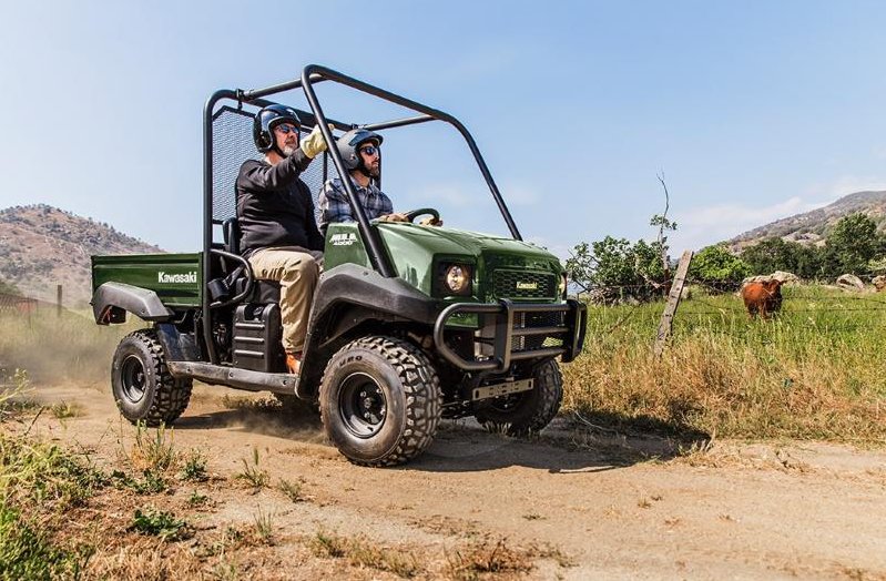 A Kawasaki utility SxS riding on the farm