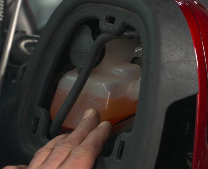 check coolant levels before cool down the motorcycle engine