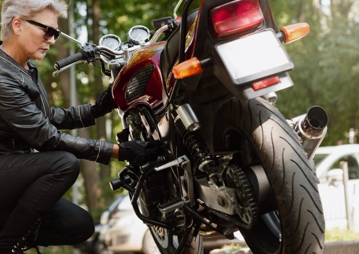 motorcycle stalls on road