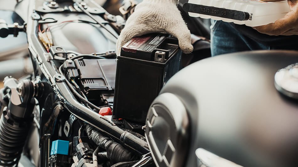 take out your motorcycle battery and protect it - Store Your Motorcycle for Winter